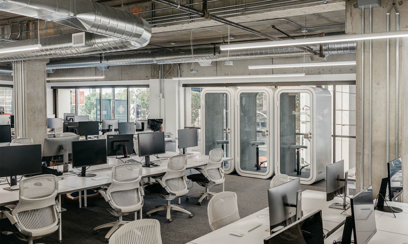 Row of Framery O office phone booths in an open plan office.