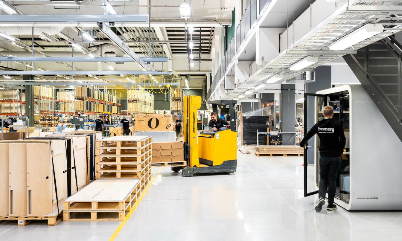 A person driving a truck in Framery headquarters in Tampere, Finland where the Framery pods are manufactured.