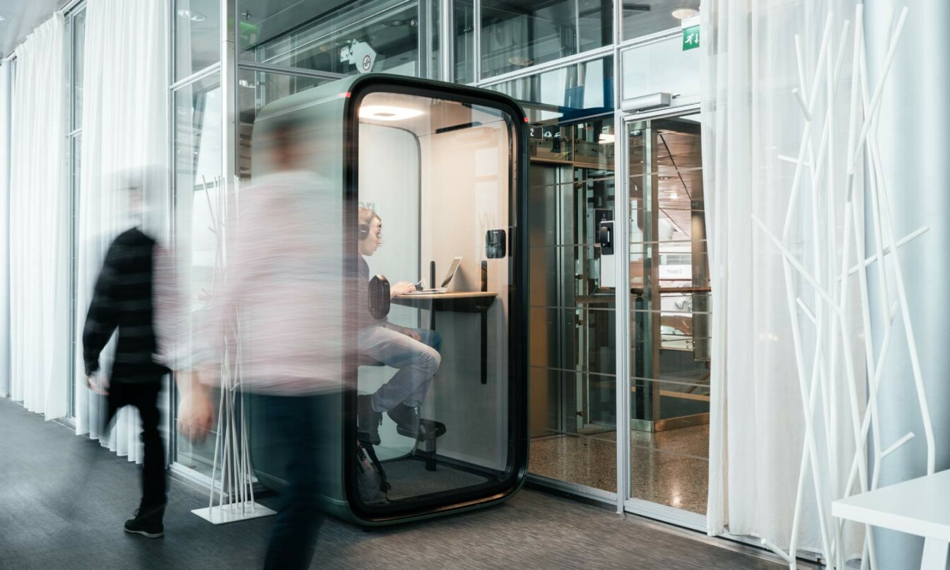 Framery One soundproof office pod in Finnair lounge, Helsinki Airport