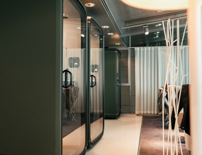 Green Framery One soundproof office pods in Finnair lounge, Helsinki Airport