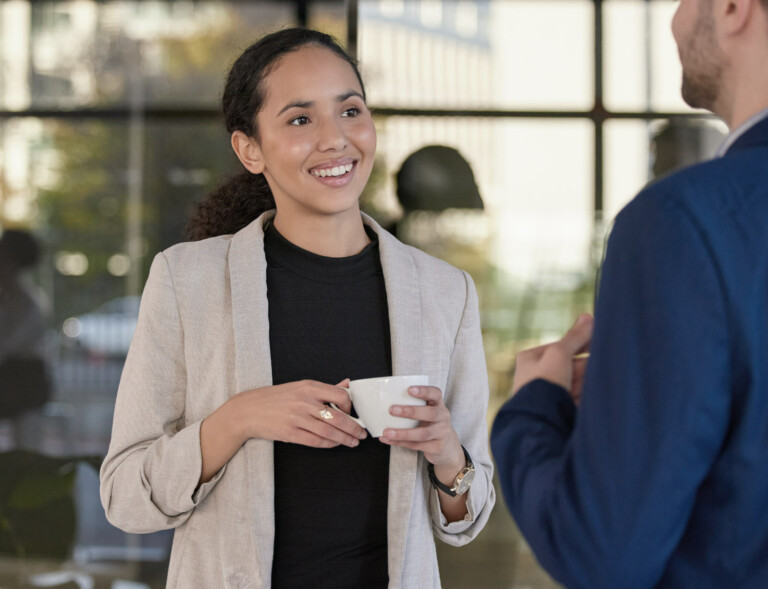 Woman laughing at work