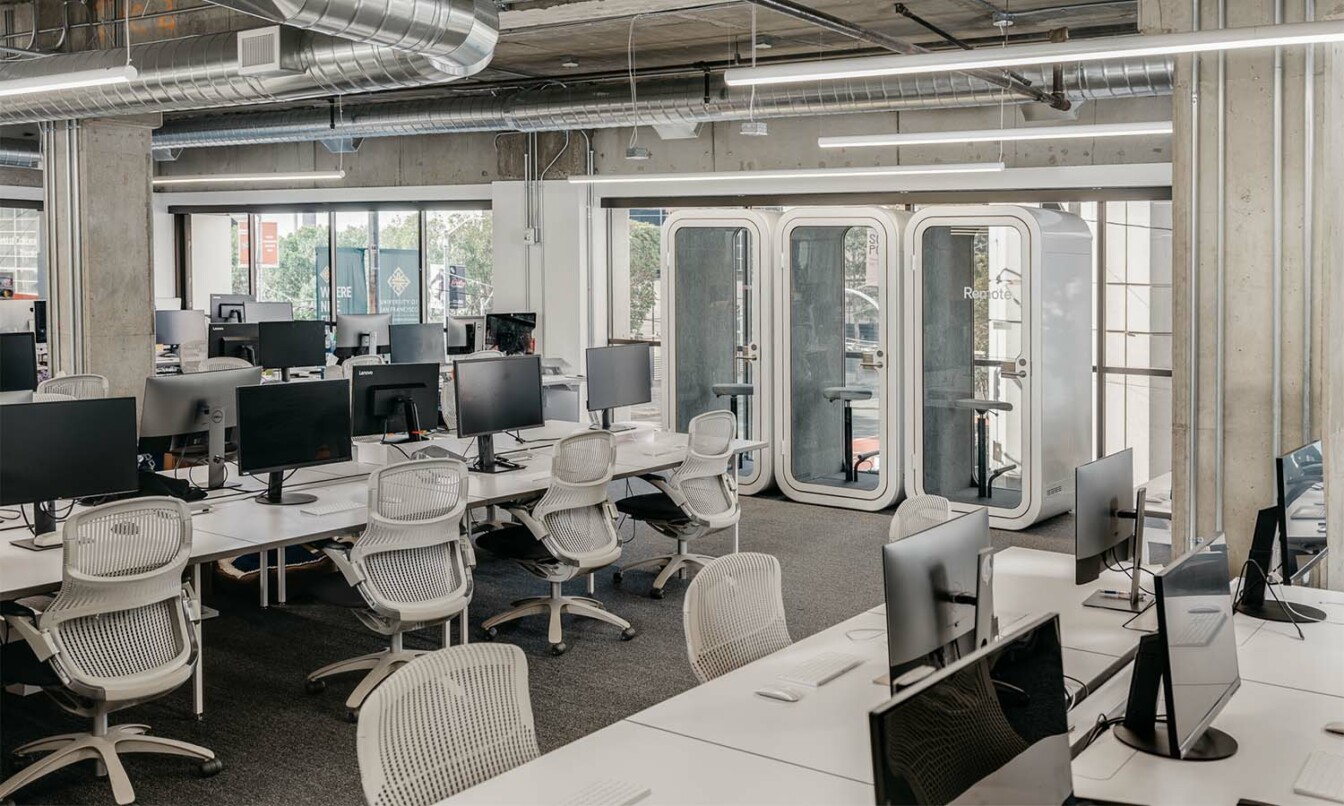 A row of Framery O office phone booths in an office creating an agile workspace environment.