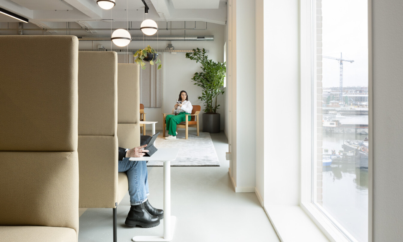 People relaxing in the Personio office, Amsterdam