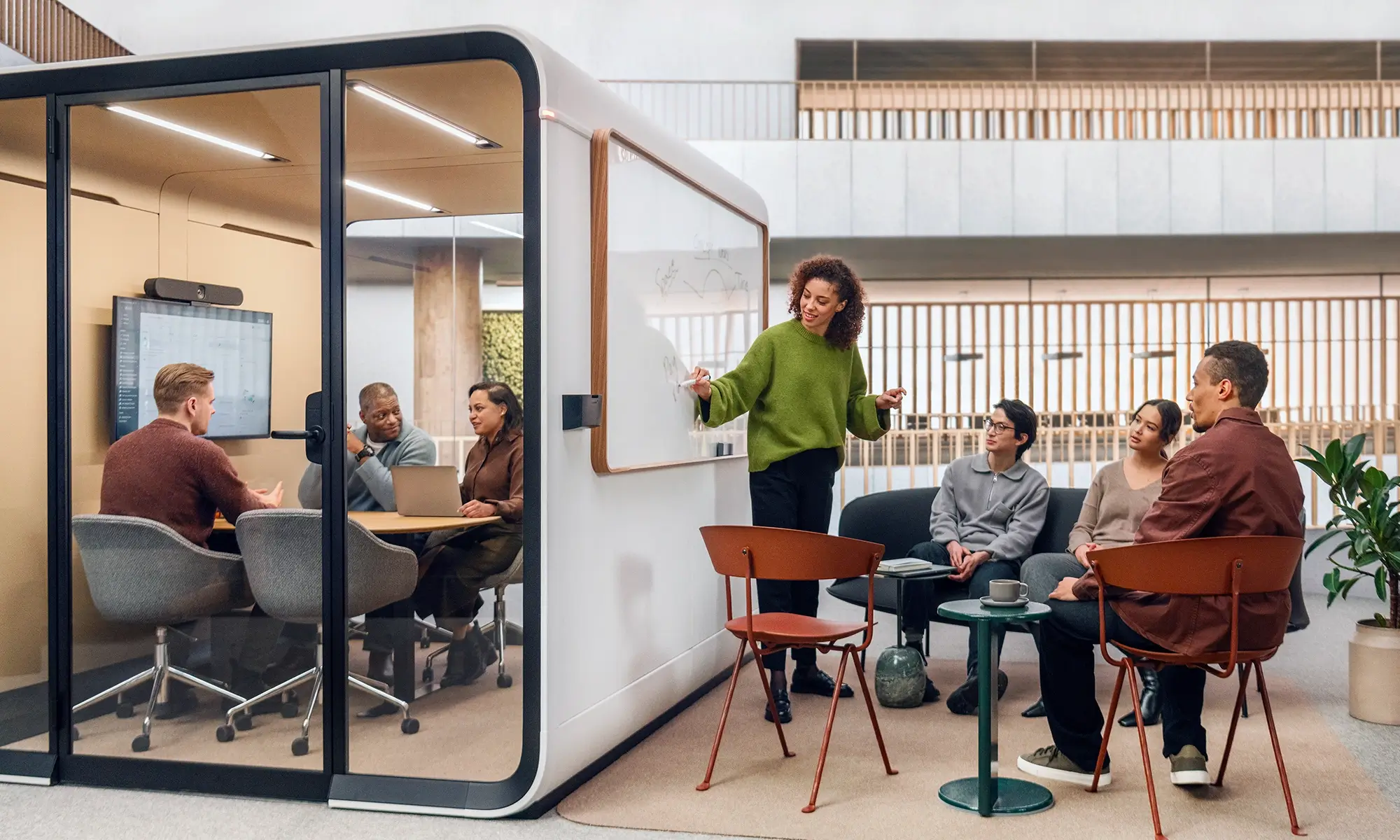 Framery Six meeting room in an open plan office.