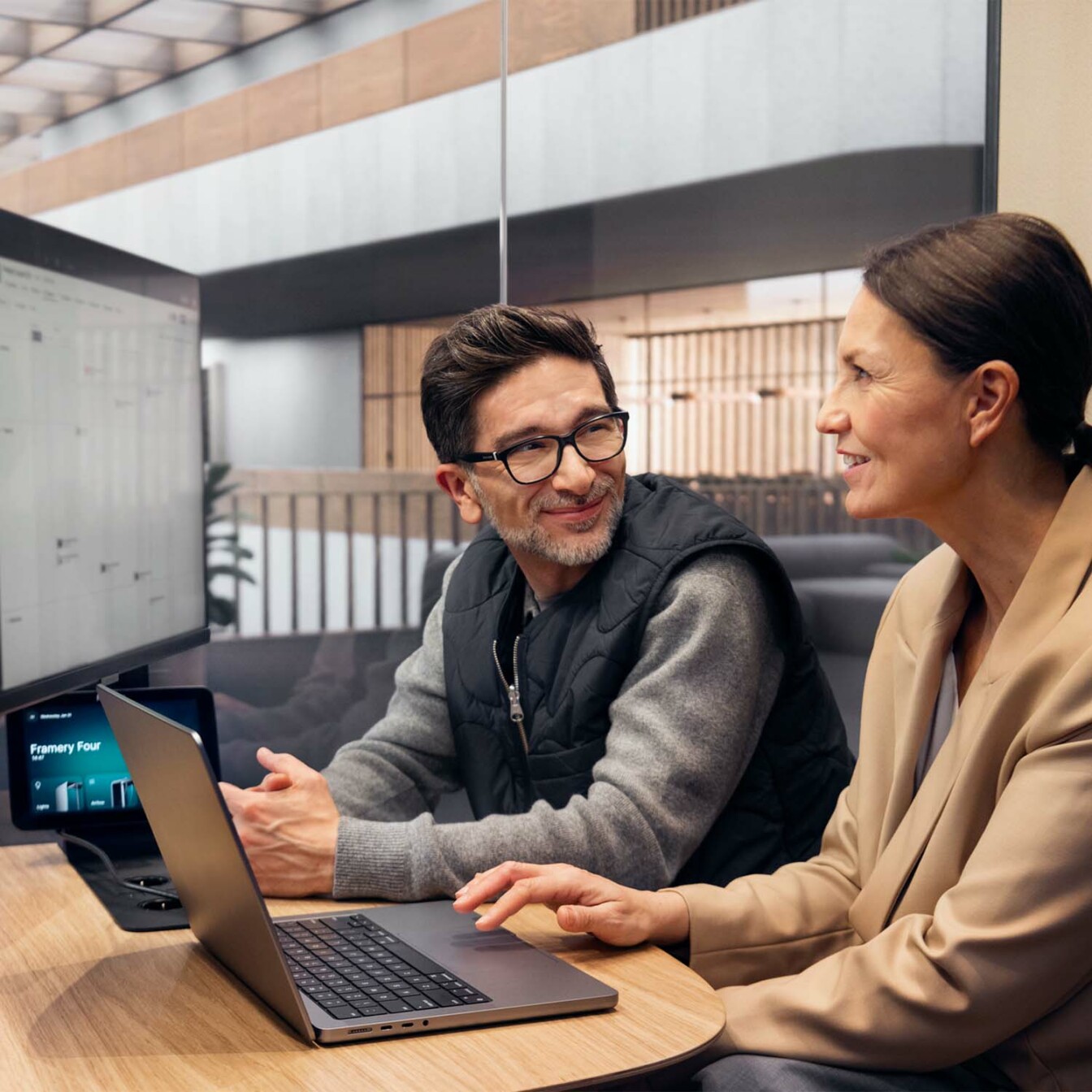 Finance team discussing in open plan office