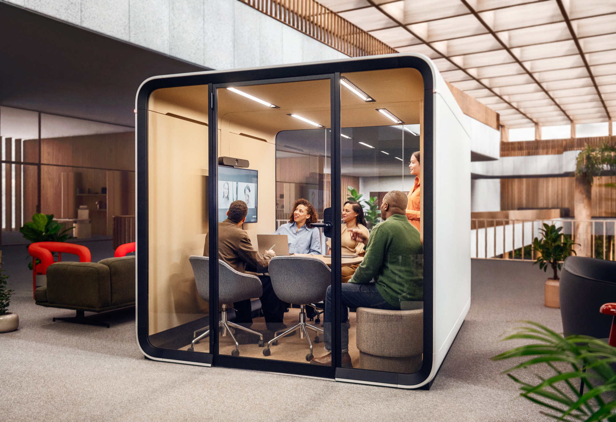 People videoconferencing in Framery Six pod.