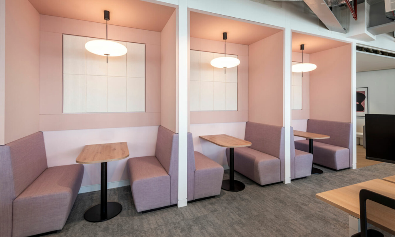 Blush colored diner style office seating.