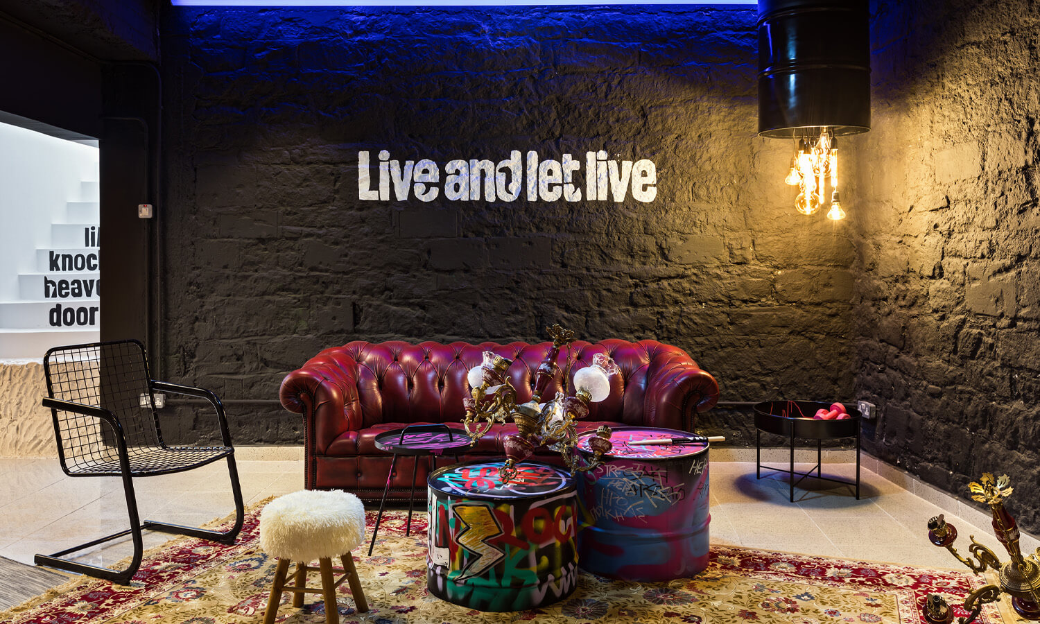 Modern punk-inspired sofa group in an office basement.