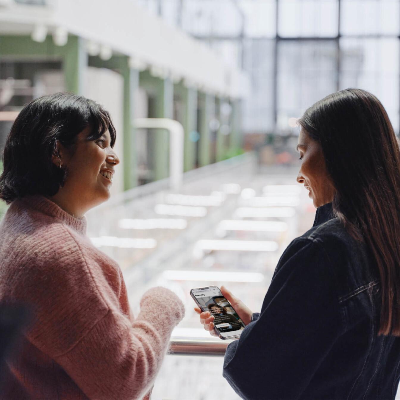Two women discussing