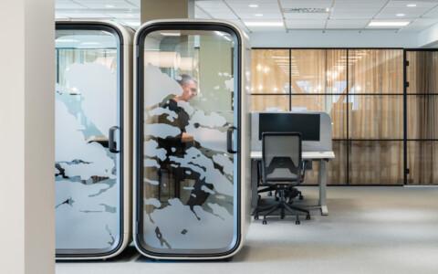 Two Framery One office pods in an office