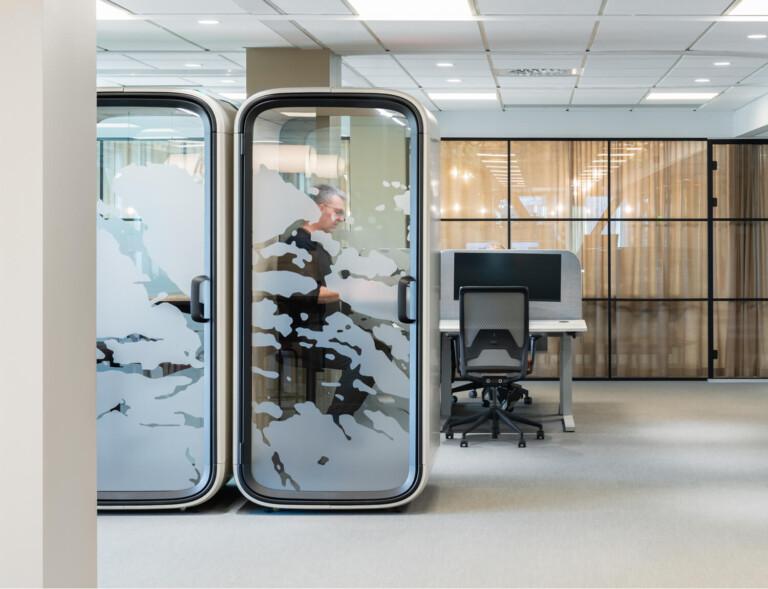 Two Framery One office pods in an office