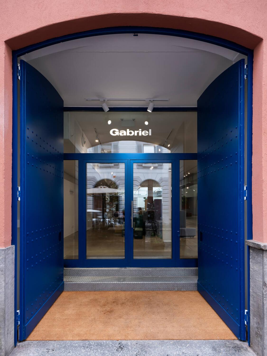 A blue and blush front doorway to a showroom.