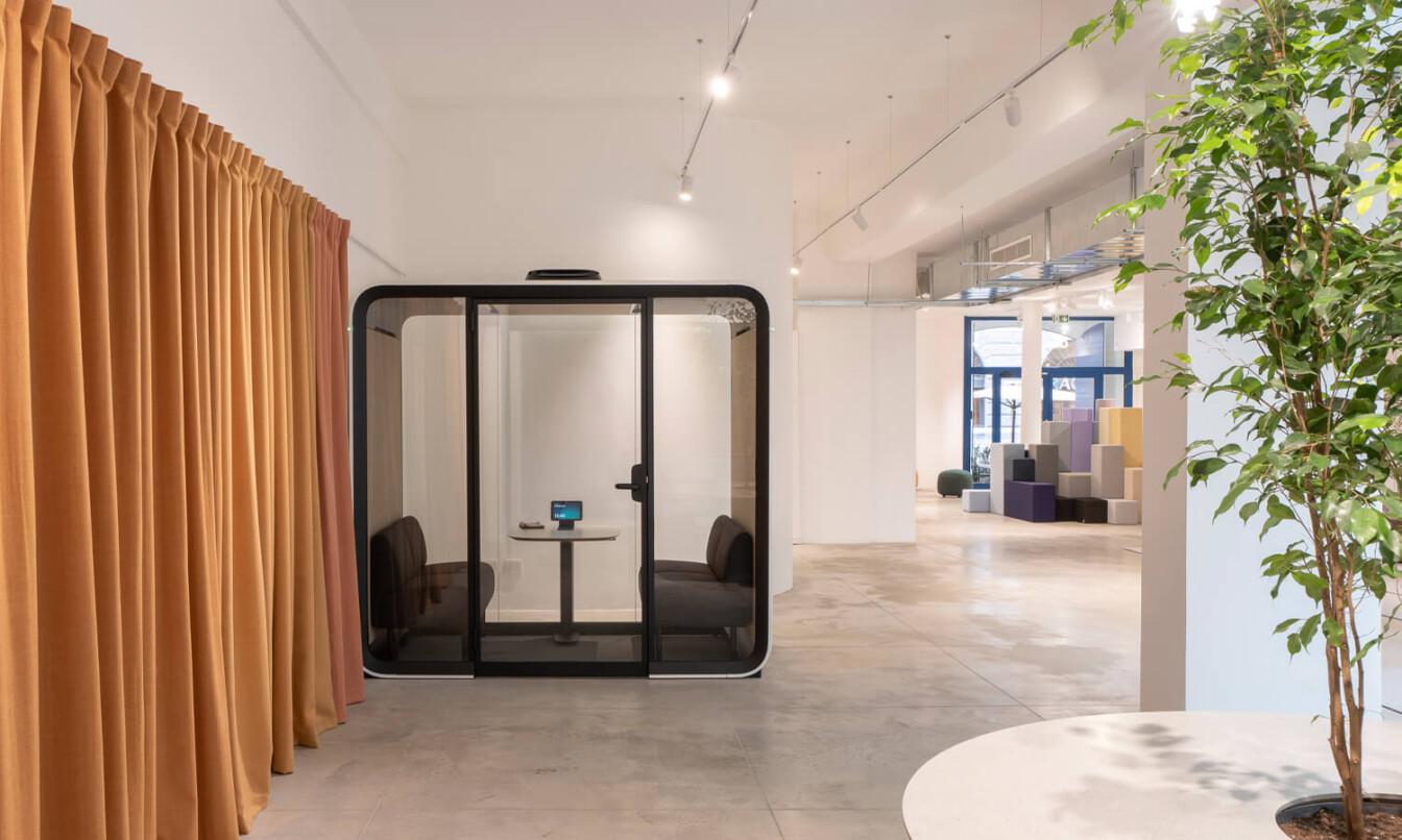 Framery Four meeting pod in a showroom