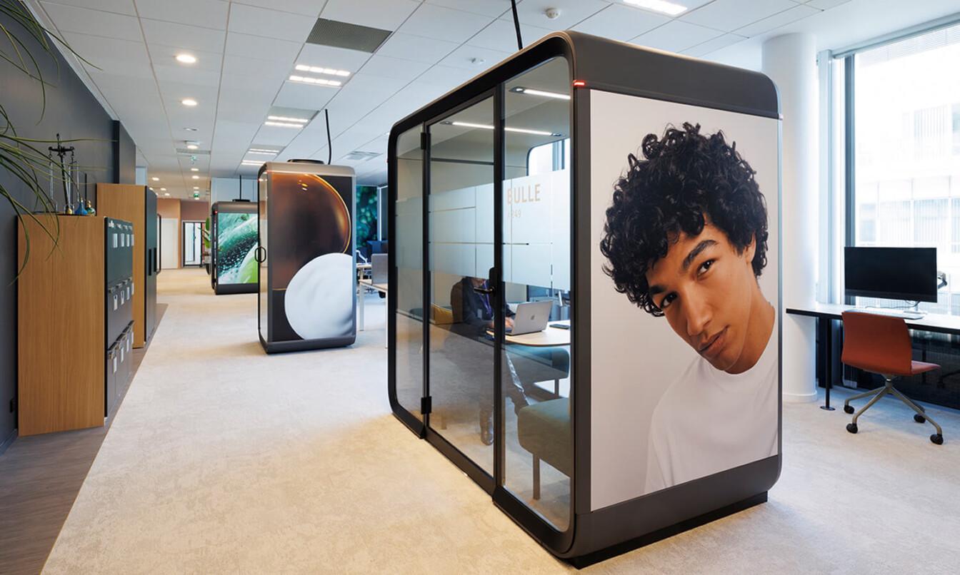 Custom foiled Framery office pods and meeting pods at L'Oreal Paris office.