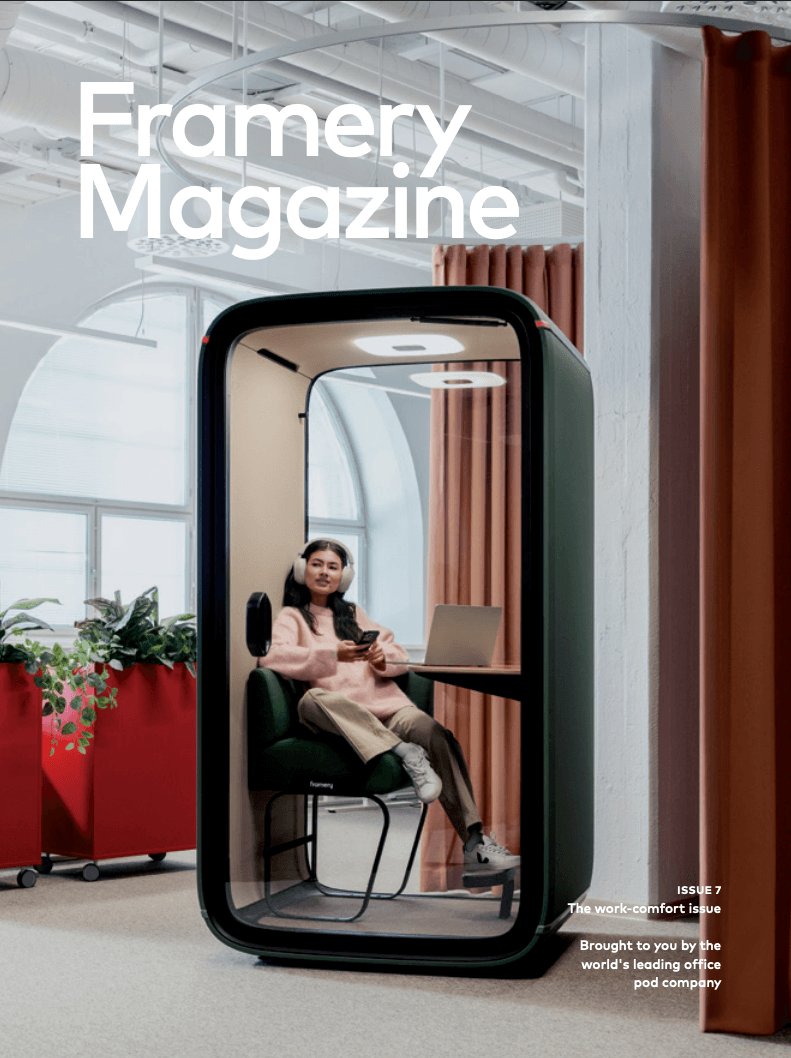 Cover of Framery Magazine showing a woman seated inside a glass-fronted soundproof pod in an office.