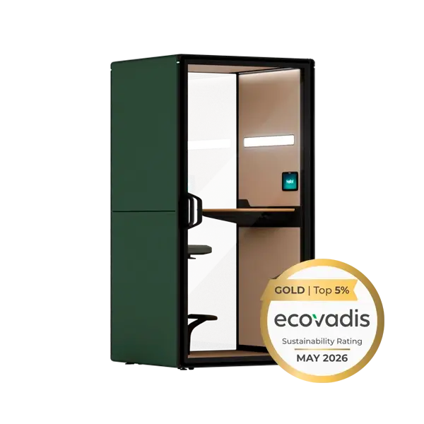 Green privacy pod with a desk and chair inside, plus an Ecovadis badge.