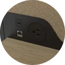 A curved black faceplate houses a USB port and a three-prong electrical outlet.