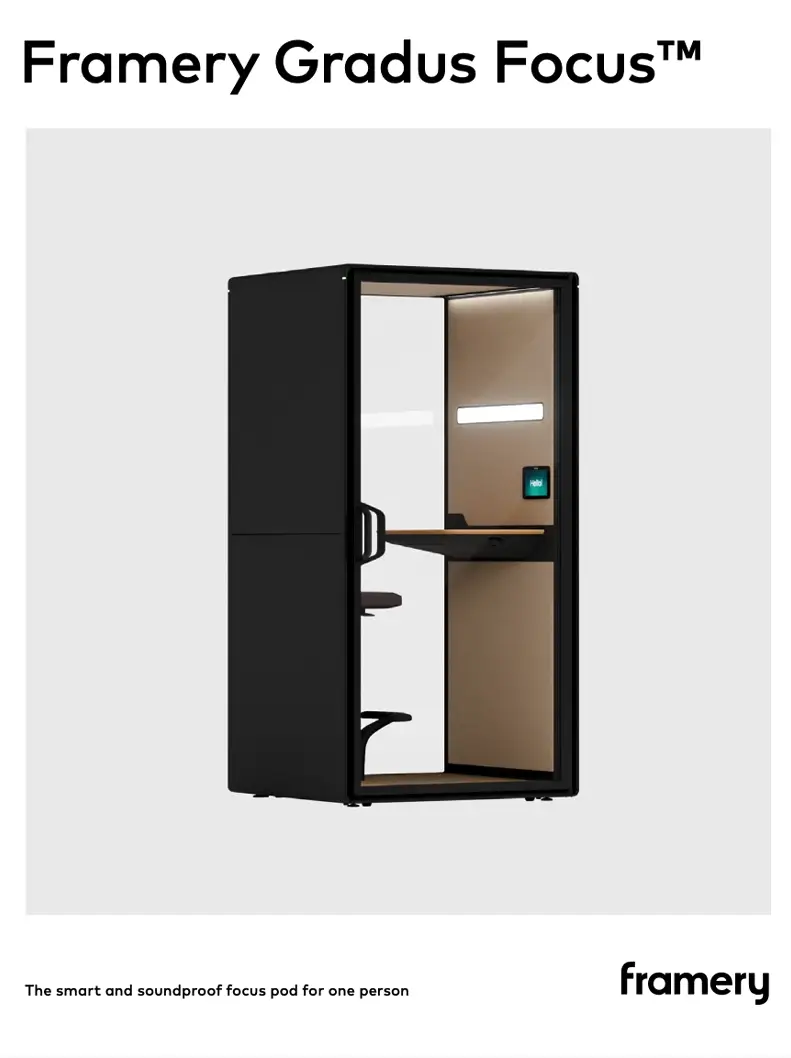 A black exterior Framery Gradus Focus single-person soundproof pod with an open door, showing a wood-paneled interior and built-in bench.
