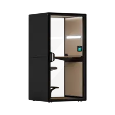A Framery Gradus Focus smart and soundproof focus pod with a desk, chair, and built-in lighting.